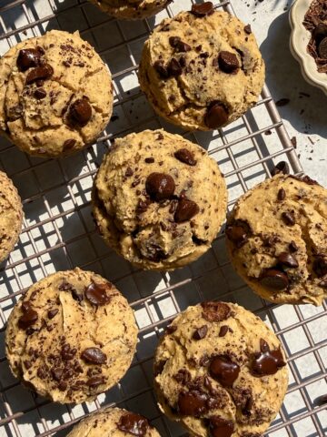 Top down image of buckwheat muffins on wire cooling rack.