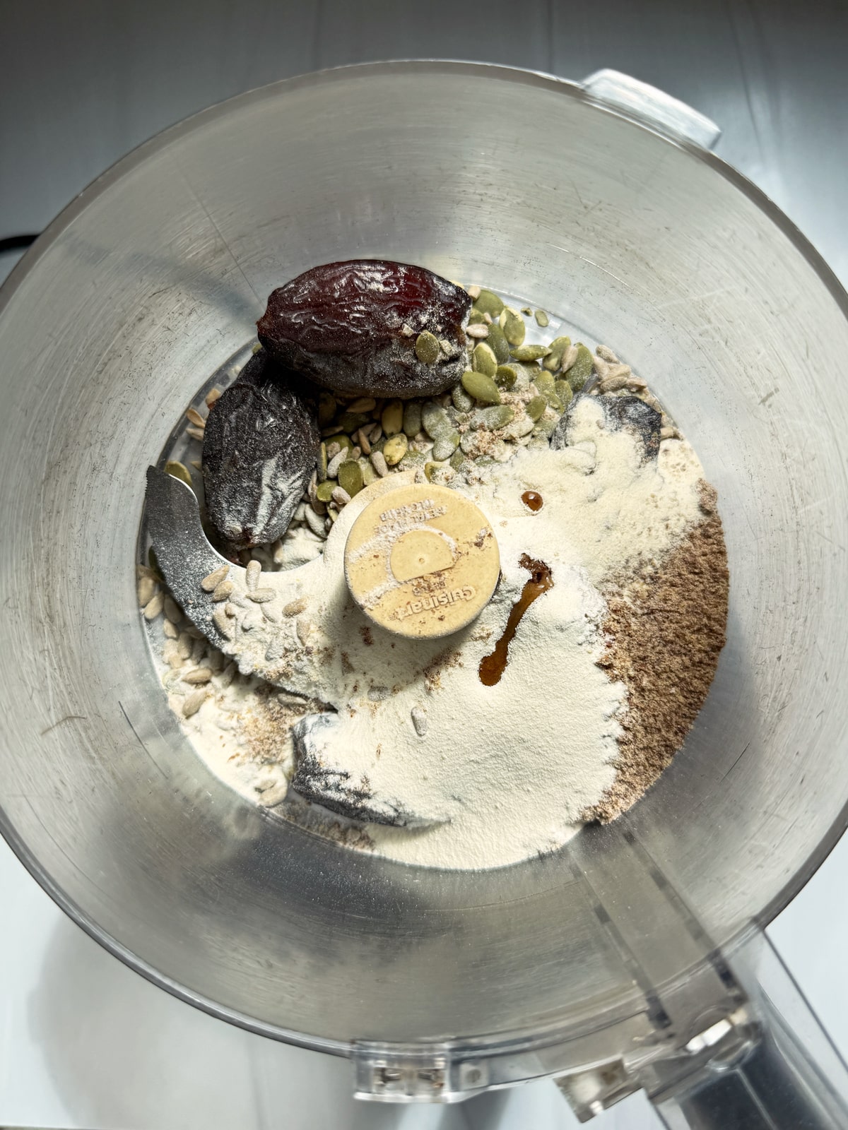 Ingredients in food processor, ready to blend.