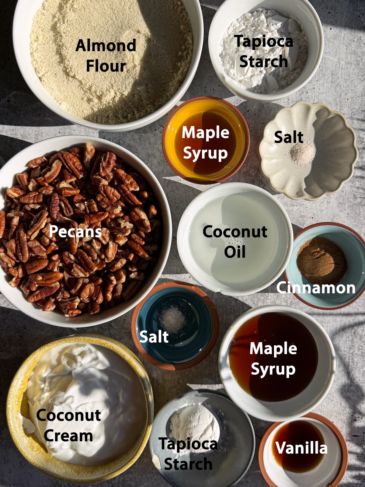 Ingredients needed to make gluten free maple pecan bars.