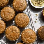 Top down view of muffins on wire cooling rack.