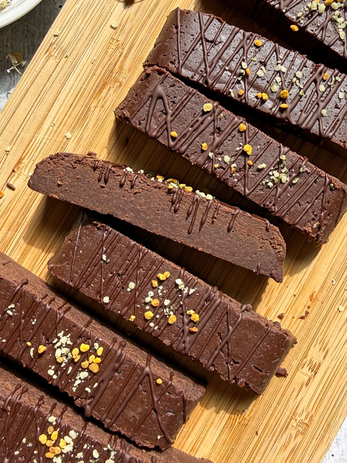 Top down view of protein bars on cutting board.