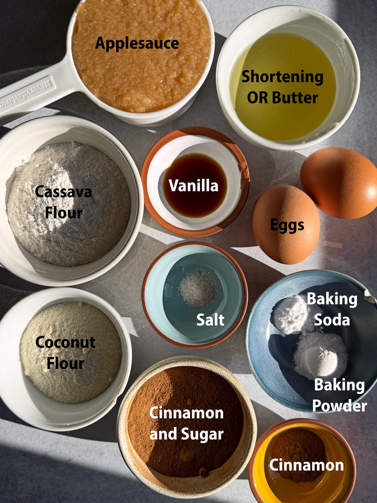 Ingredients needed to make applesauce donuts.