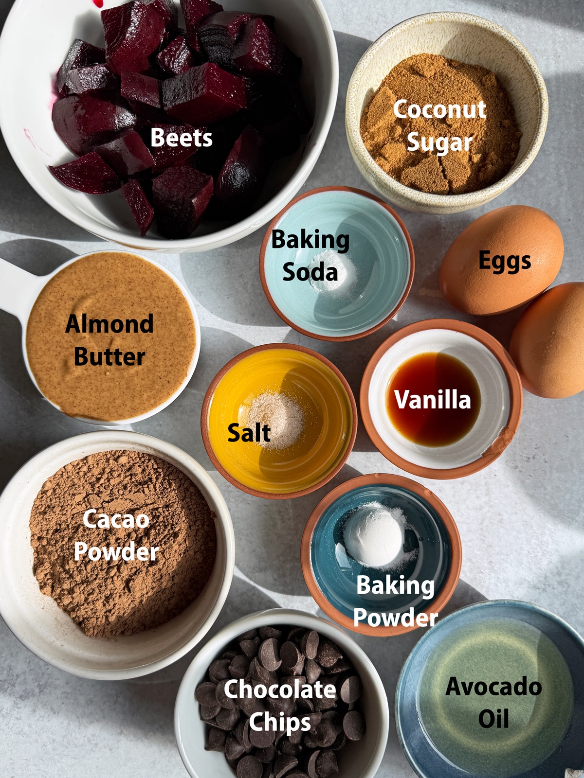 Ingredients needed to make healthy chocolate beet muffins.