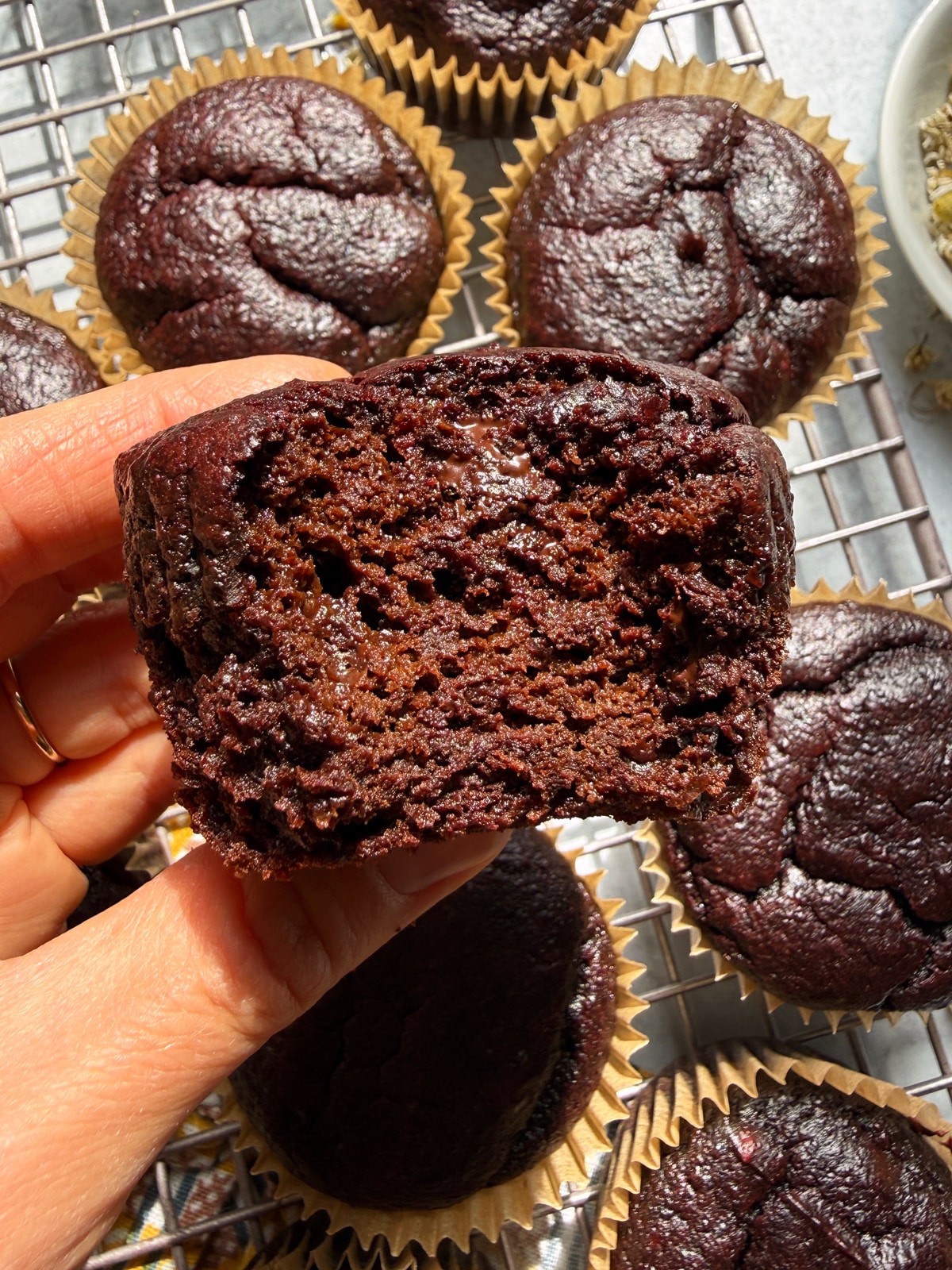 Bite of a muffin to show the texture.