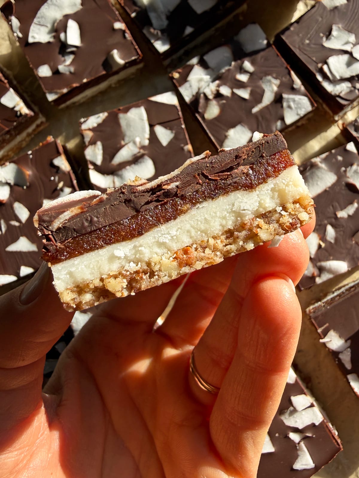 Holding a bar.