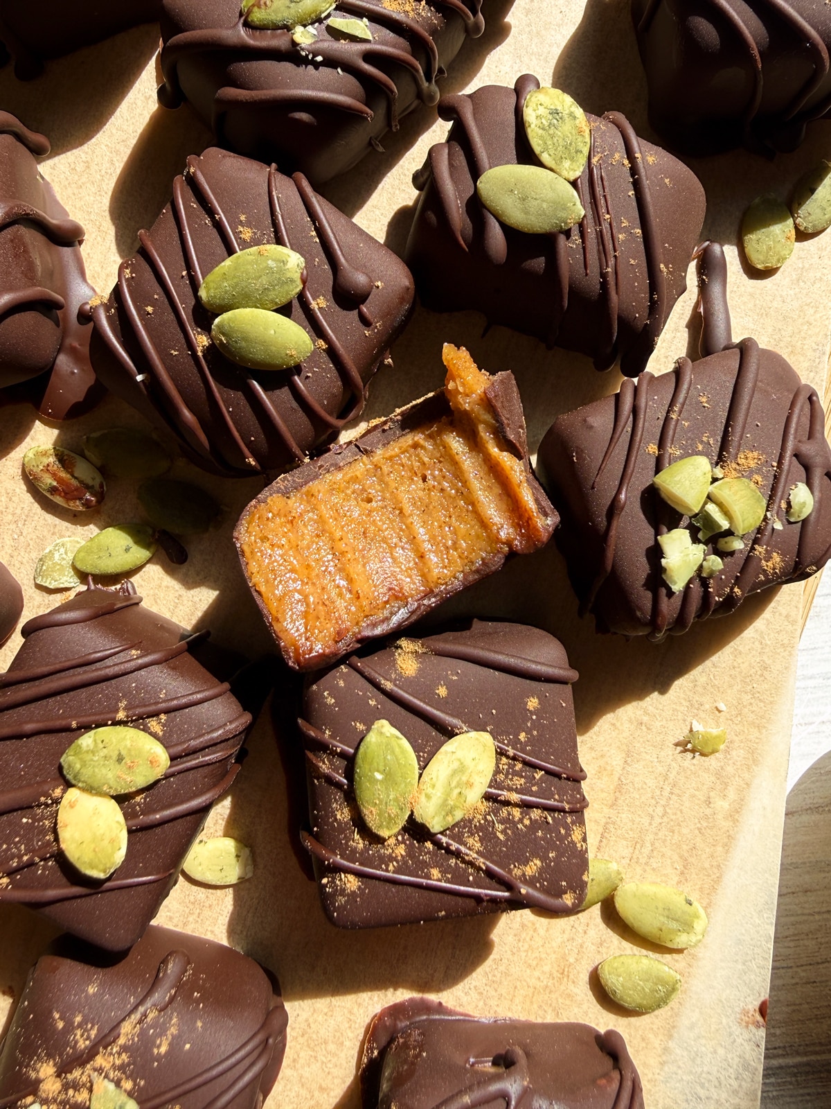Bite of a caramel to show the inside texture.