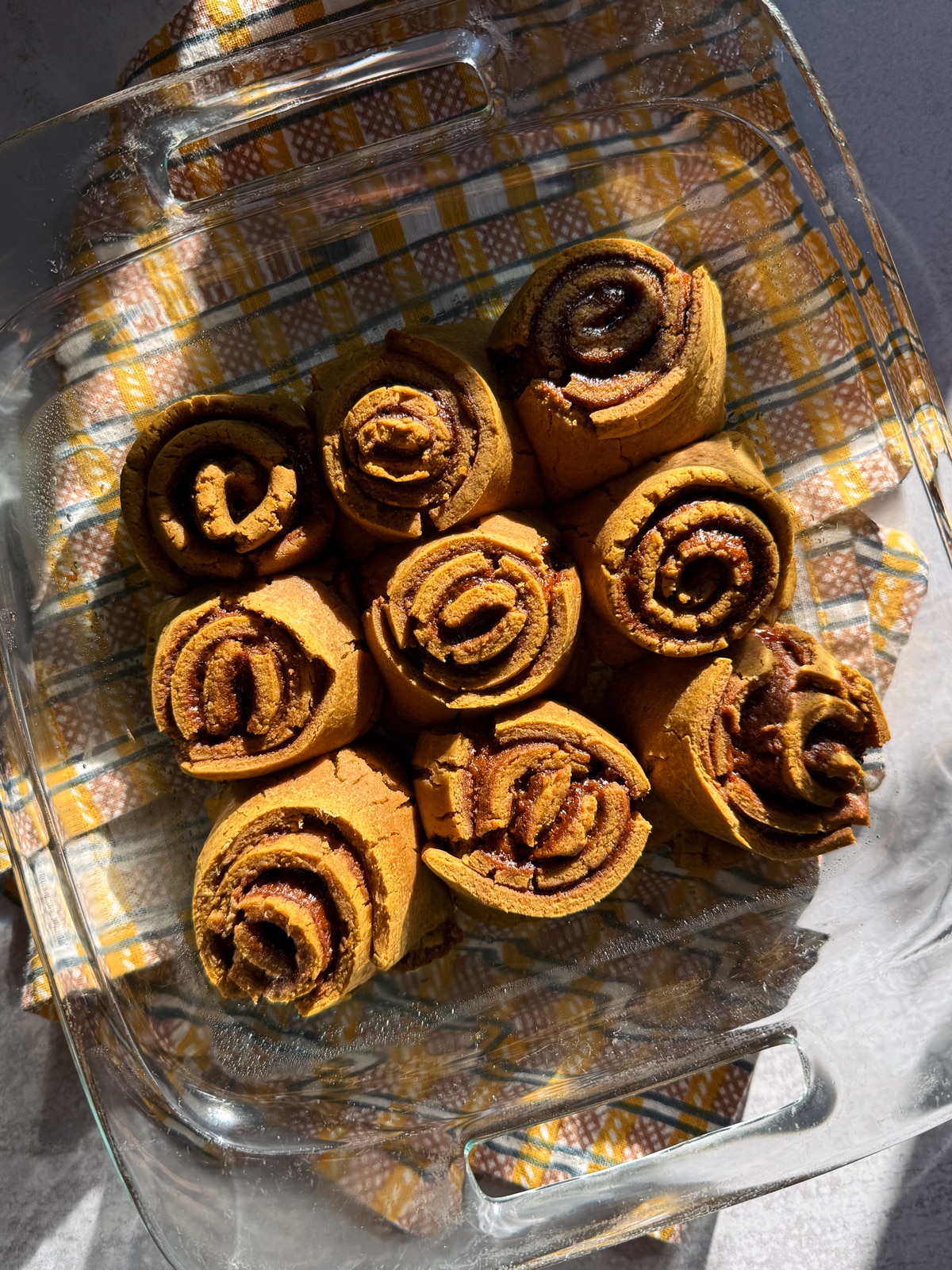Top down view of freshly baked cinnamon rolls.