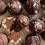 Top down view of hazelnut truffles.