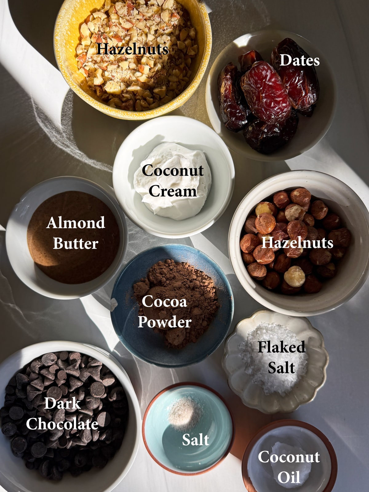 Ingredients needed to make chocolate hazelnut truffles.
