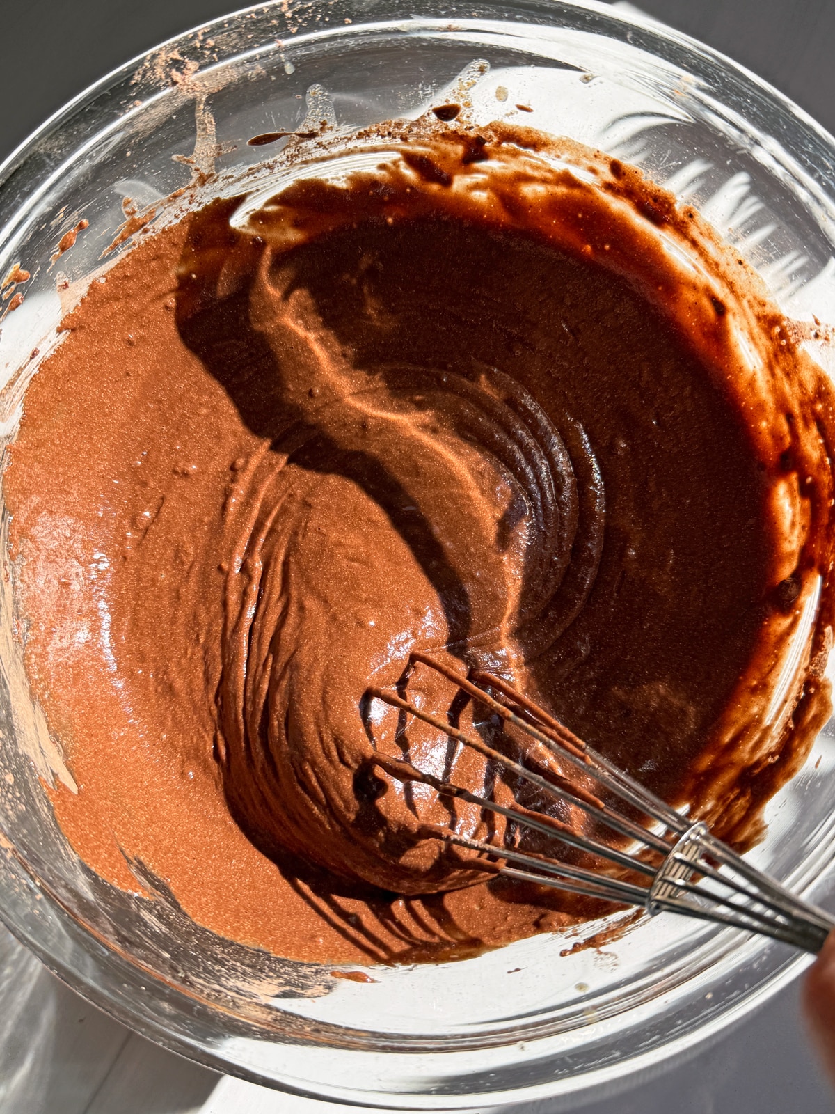 Mixing the batter for the cupcakes.